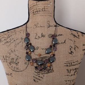 Multi strand metallic beaded statement necklace
